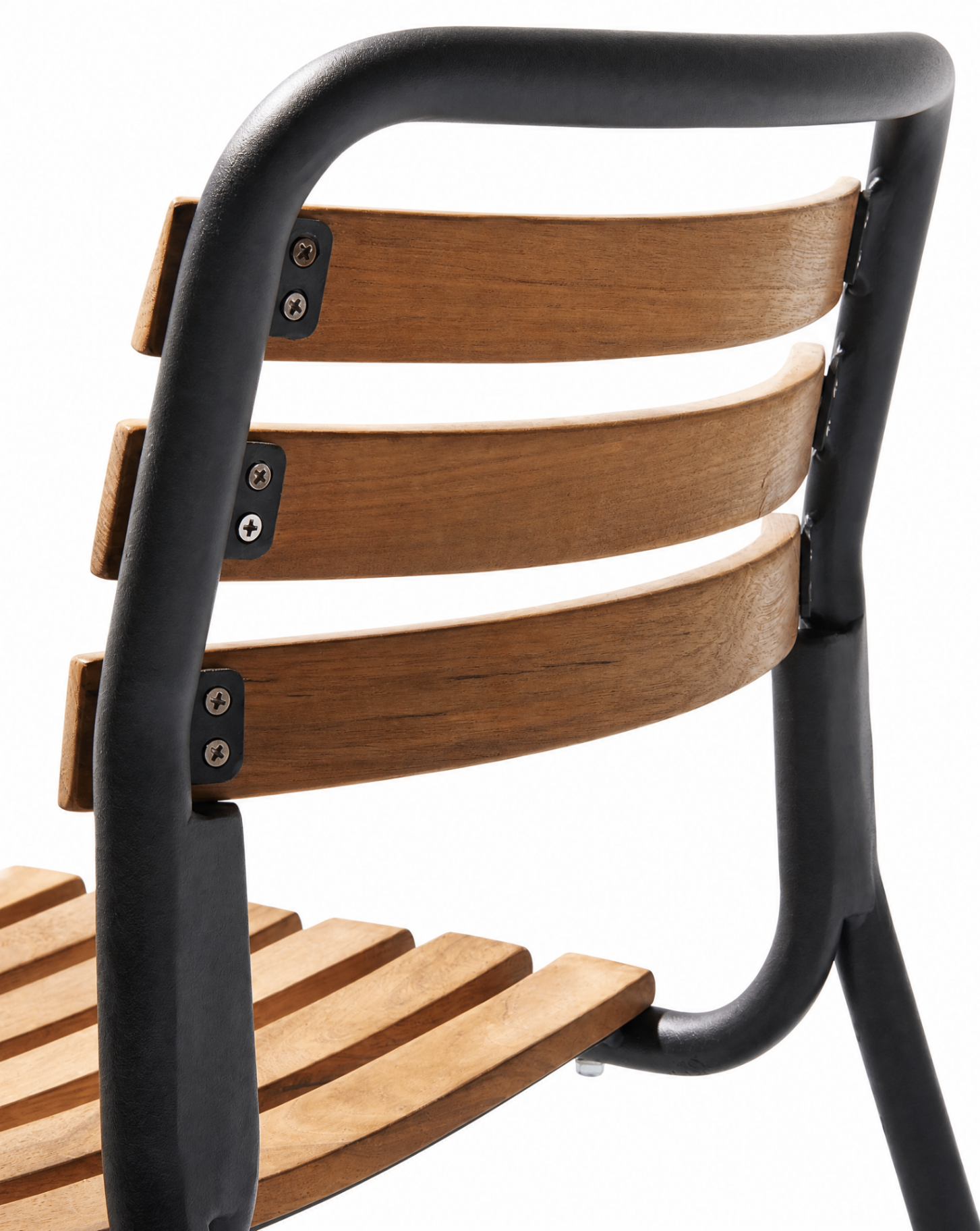 Detail of teak slats and black metal frame on an outdoor chair